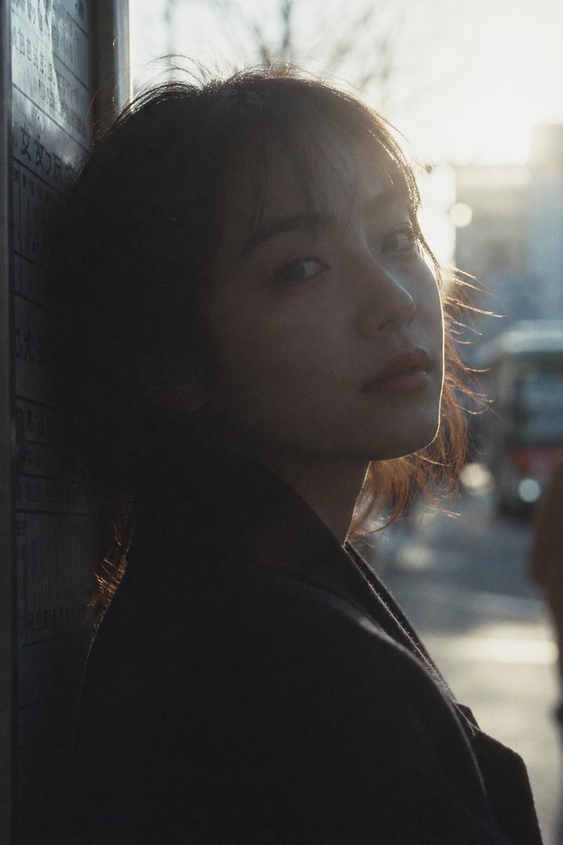 {argument name="style" default="Japanese negative film aesthetic"}, close-up street silhouette portrait at {argument na…