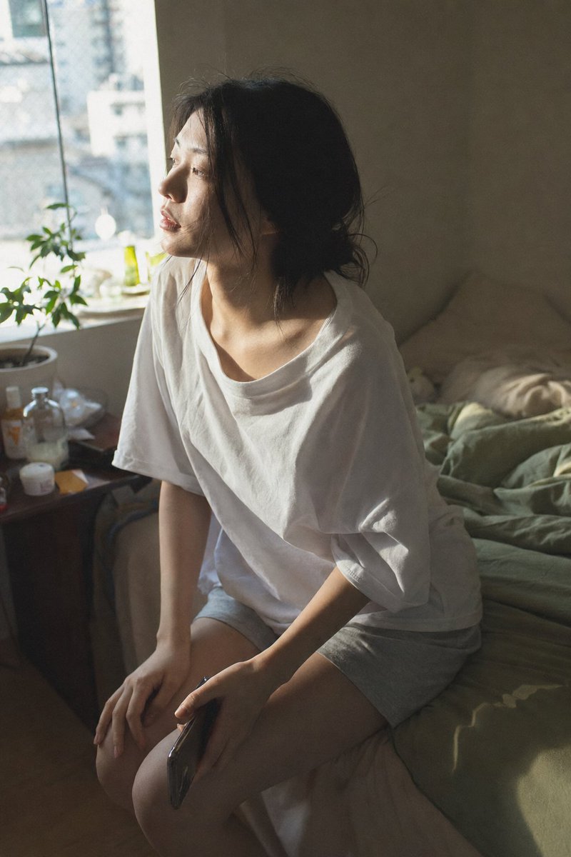 Create a vertical close-medium authentic daily-life photograph of {argument name="subject" default="a young Japanese wo…
