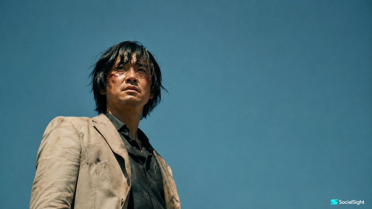 Create a cinematic realistic film still of a wounded {argument name="subject" default="Asian man"} standing under a vas…