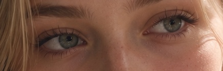 Create an ultra-photorealistic extreme close-up crop of a young woman’s eyes and upper nose bridge, focusing on detaile…