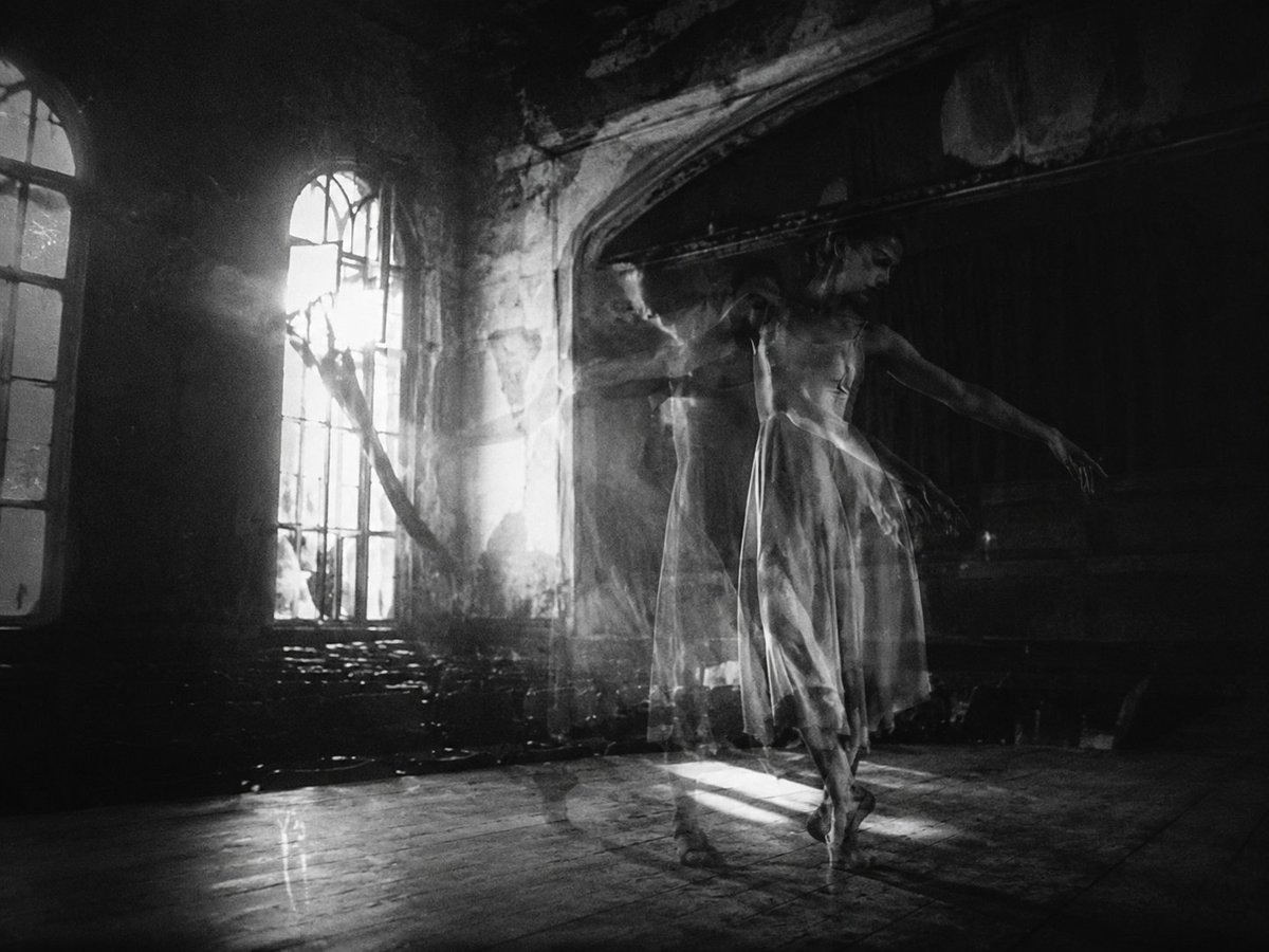 Create a cinematic black-and-white fine-art photograph of {argument name="subject" default="a ghostly ballerina"} danci…