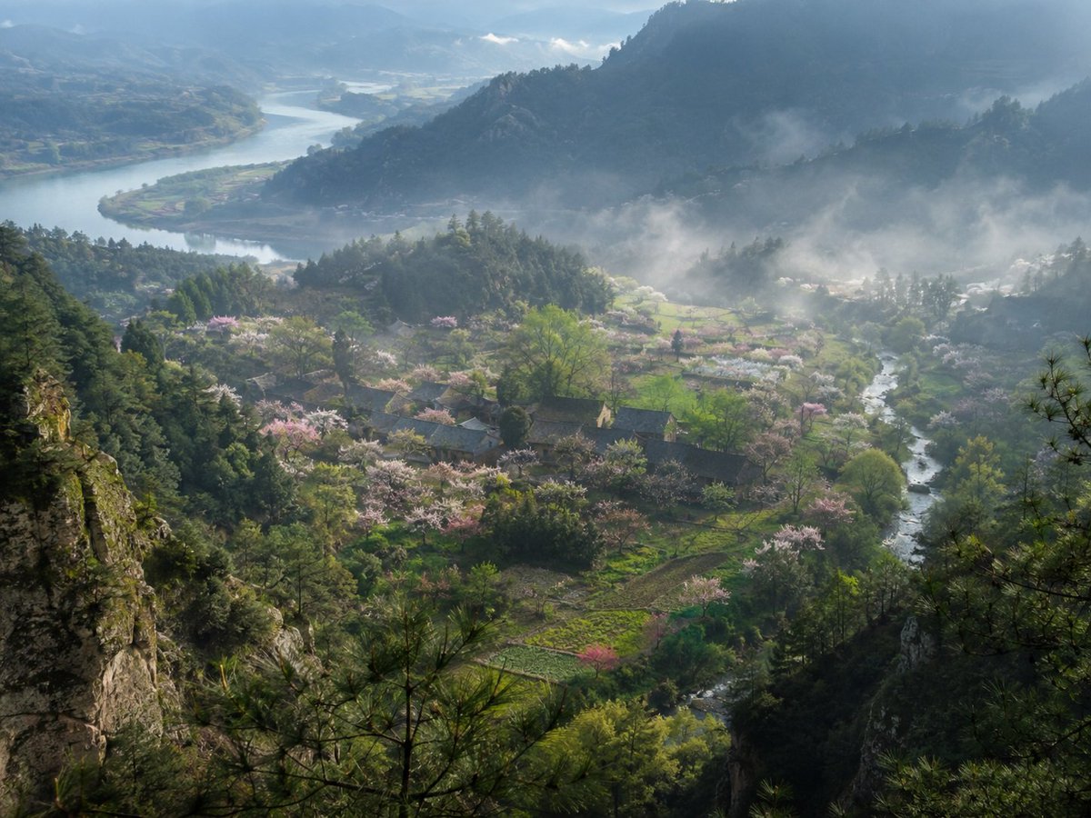 Create a collectible fine-art landscape photograph as if captured by a world-class National Geographic photographer: a …