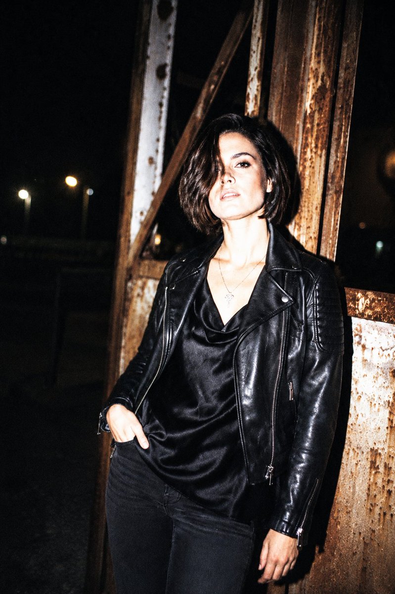 Transform the photo into {argument name="style" default="nighttime chic flash photography"}. Use harsh direct on-camera…