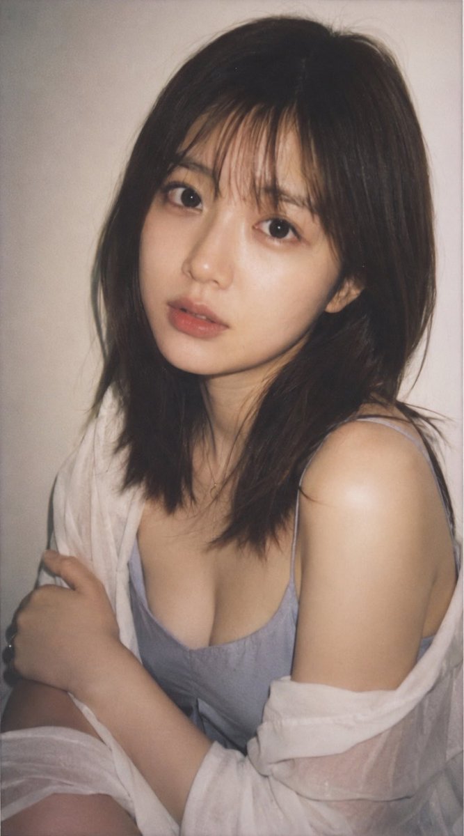 Subject: A high-quality realistic portrait of a {argument name="age" default="18-21"} year old Japanese woman, as if ta…