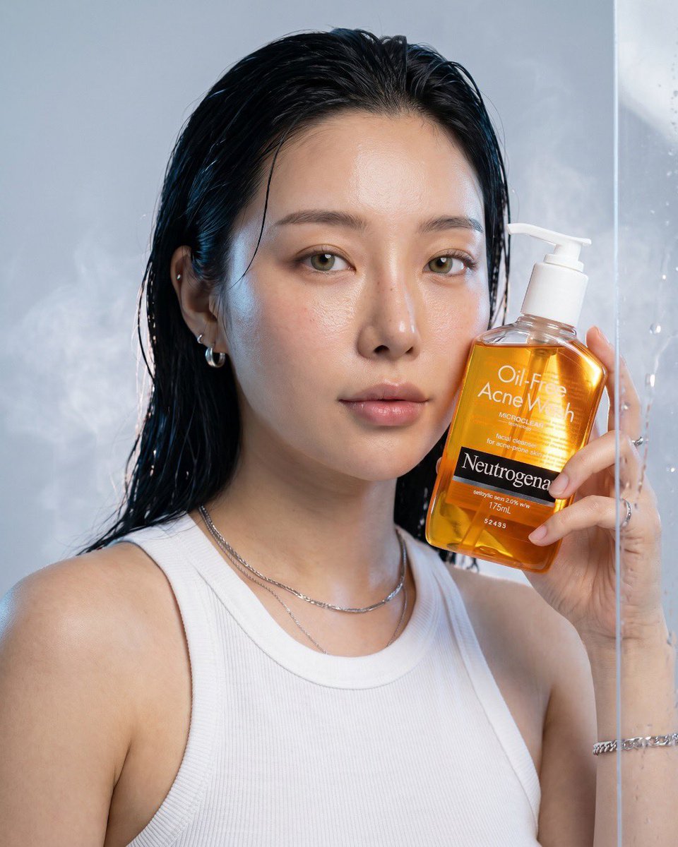 Ultra-realistic luxury skincare advertisement for Neutrogena Oil-Free Acne Wash, premium commercial product photography…