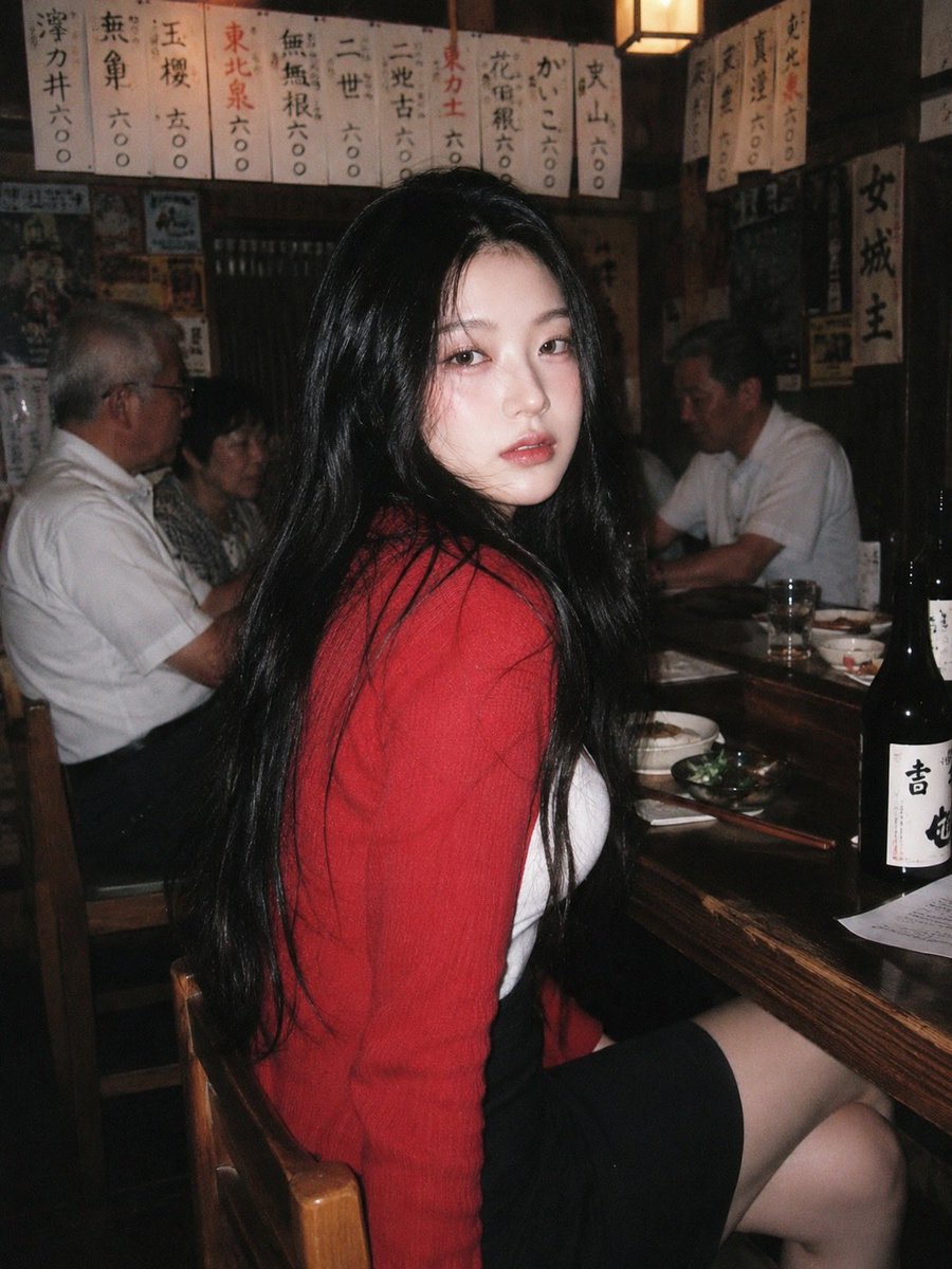 A 90s disposable-camera style flash snapshot taken inside a {argument name="location" default="small, bustling Japanese…